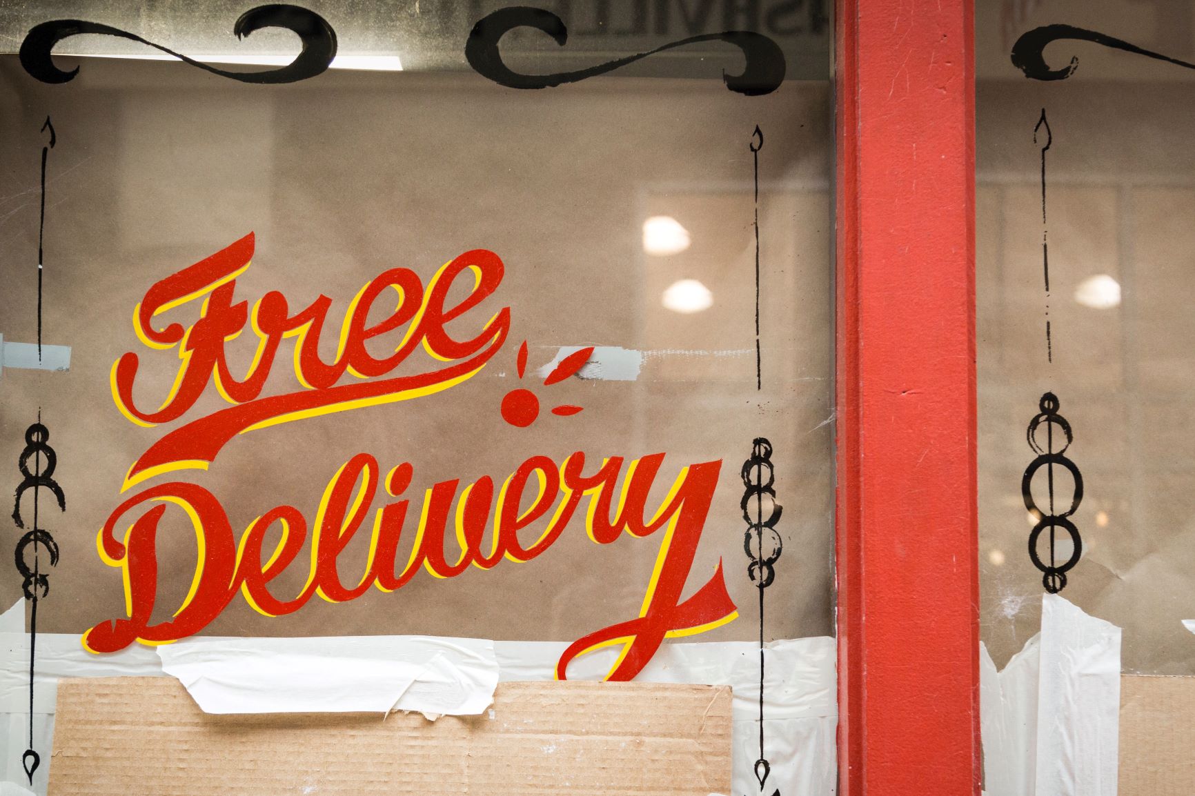 Free delivery sticker on window